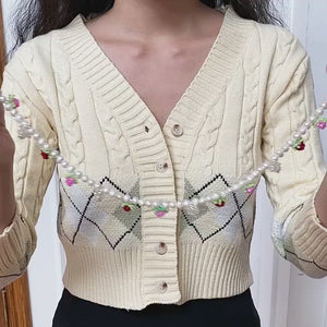 
            
                Load and play video in Gallery viewer, Raquel Cable Knit Argyle Cardigan
            
        
